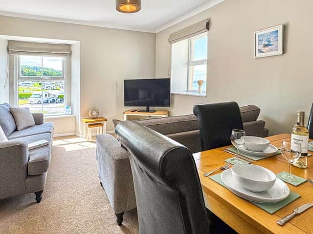 Living room/dining room | Sunset Cottage - Bron Y Wendon Holiday Park, Llanddulas, near Llandudno
