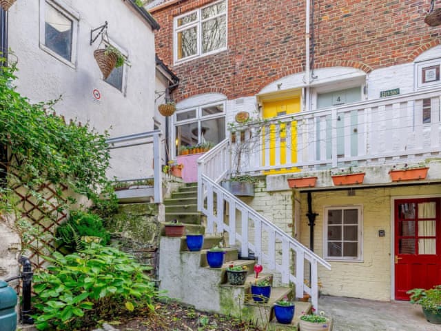 Attractive courtyard with steps to entrance | Sayers Yard, Whitby
