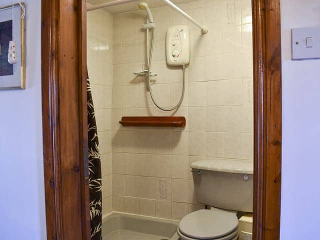 Shower room with sink and toilet situated on first floor off the main bedroom | Robsons Cottage, Alston