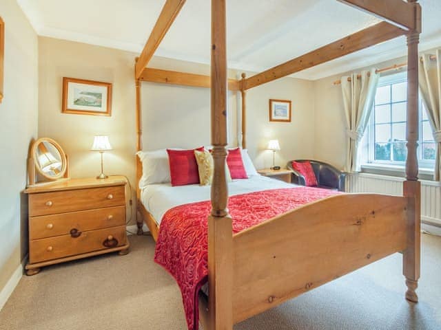 Four Poster bedroom | Smugglers Rock House, Ravenscar, near Robin Hoods Bay