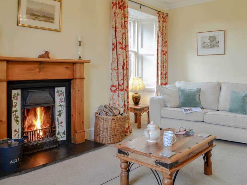 Warming open-fire within living room | Strathisla Farm Cottages- Islabank Farmhouse - Strathisla Farm Cottages, Meigle