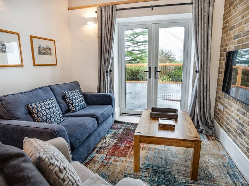 Living area | Cowshed 1 - Cowshed Cottages at Travellers Rest Yard, Llanboidy
