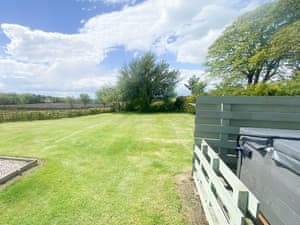 Wonderful, relaxing hot tub overlooking the beautiful garden | Grey Craig, Kirtlebridge near Annan