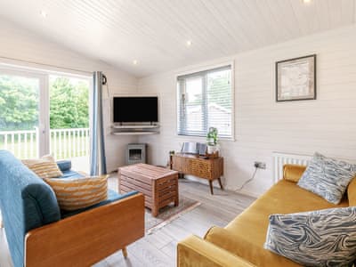 Living area | Erica Lodge, Willington