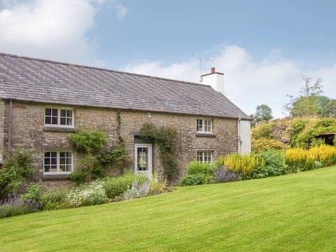 Lawned garden area to the rear | Lletty Cottage - Lletty Farm, Penrherber, Newcastle Emlyn