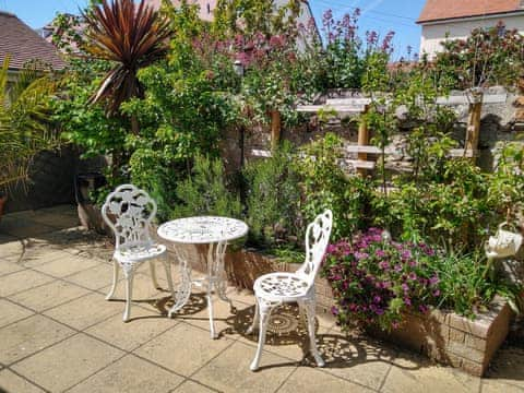 Outdoor area | Garden Apartment - Acacia Apartments, Llandudno