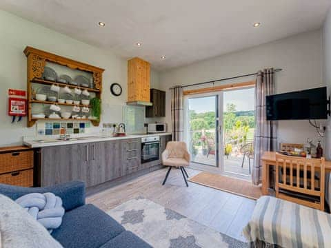 Open plan living space | Cwtch Enrico - Hen Efail Holiday Cottages, Furnace, near Machynlleth