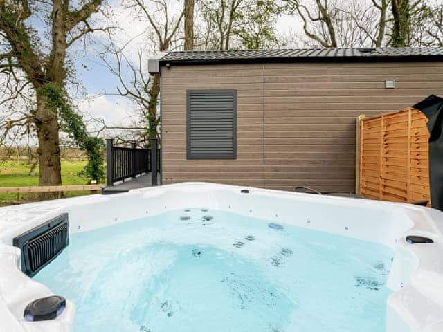 Hot tub | Woodpecker Lodge - Hole Farm, Alderbury, near Salisbury