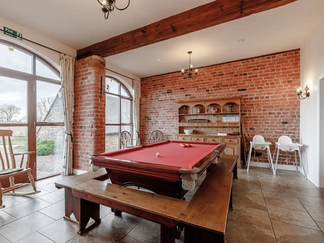 Dining table converted into a games table | The Granary - Offley Grove Farm, Adbaston, near Stafford