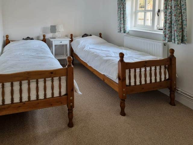 Twin bedroom | Cranberry Cottage, South Creake