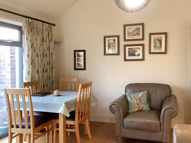 Dining area of living and dining room | Rusty&rsquo;s Cottage - Wisteria and Rusty&rsquo;s Cottages, Buttercrambe, near York