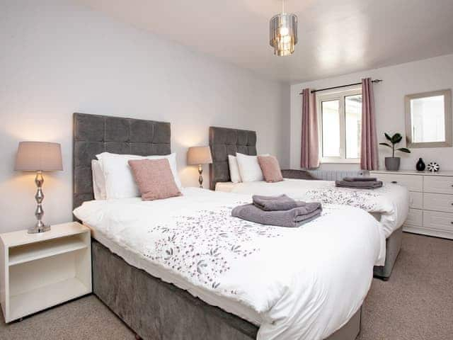 Bedroom arranged as twin beds | Higher Trewithen Holiday Cottages- The Hayloft - Higher Trewithen Holiday Cottages, Sithians, near Falmouth