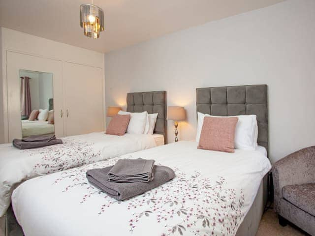 Bedroom arranged as twin beds | Higher Trewithen Holiday Cottages- The Hayloft - Higher Trewithen Holiday Cottages, Sithians, near Falmouth