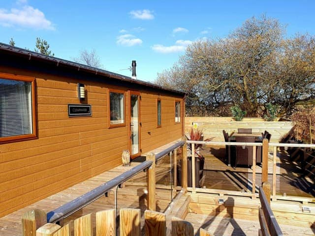 Outdoor area | Serenity Lodge - Felmoor Holiday Park, Felton