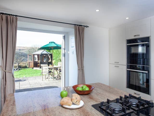 Kitchen area | Dunstone Cottage, Cadover Bridge