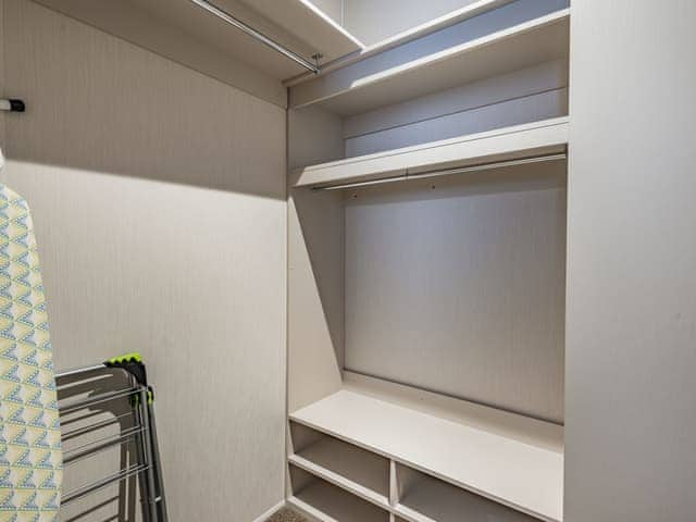 Wardrobe and storage area | Reed Roost - The Laurels, Addlethorpe, near Skegness