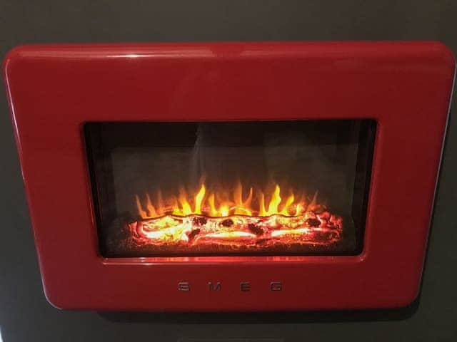 stylish wall mounted modern electric fire | 1 Lamb Barn, Clacton-on-Sea