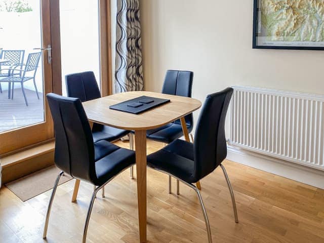 Dining room area with easy access to the patio for al fresco dining | The Old Laundry 4, Keswick