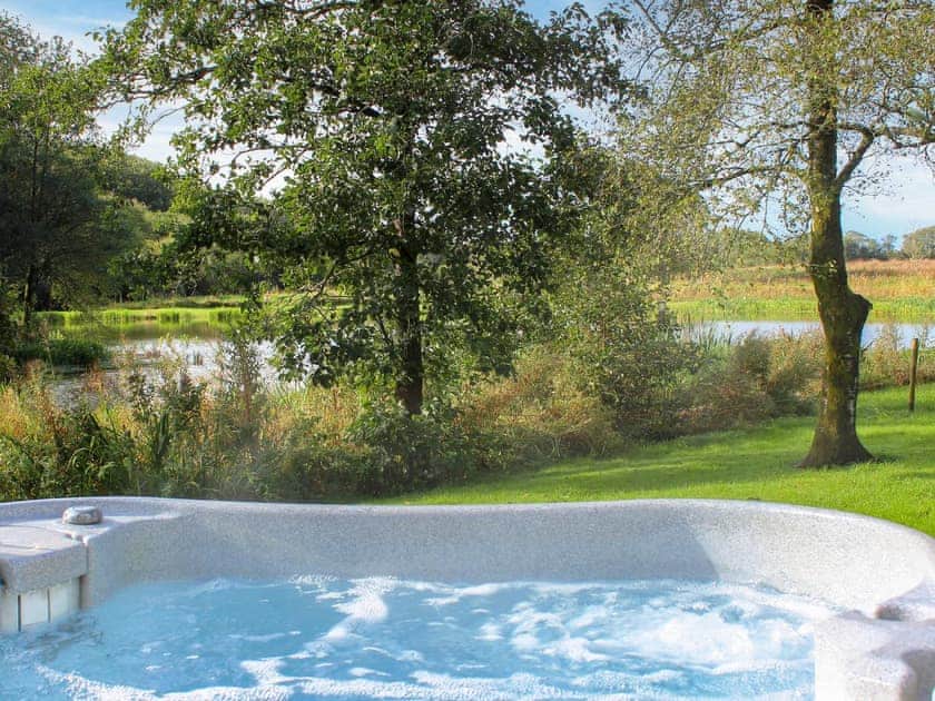 Hot tub | The Lodge - Maesydderwen Holiday Cottages, near Llandeilo