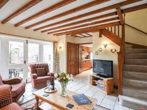 Living room | The Old Coach House - Hanley Farm, Hook-a-Gate, near Shrewsbury