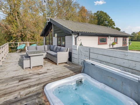 Outdoor area with hot tub | The Lodge, Bubwith, near Howden