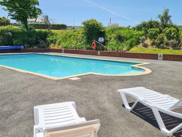 Shared heated Swimming pool | Honeysuckle Cottage, Willingcott Valley, Woolacombe