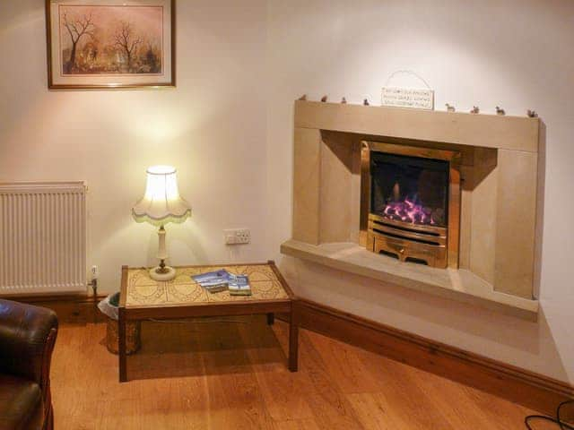 curl up in front of the cosy fire and enjoy a quiet evening in | Hollin Bank Cottage, Salterforth, near Barnoldswick