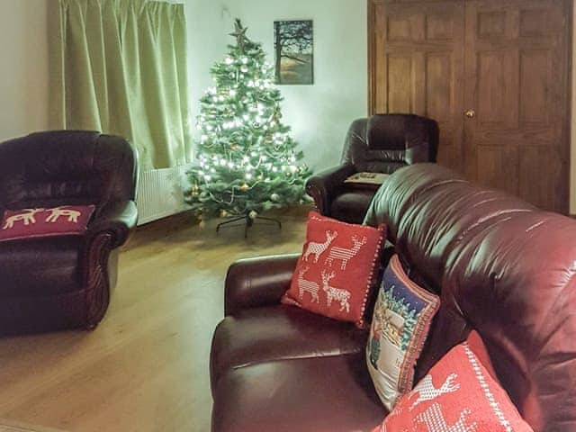 spend winter evenings in the cosy lounge | Hollin Bank Cottage, Salterforth, near Barnoldswick