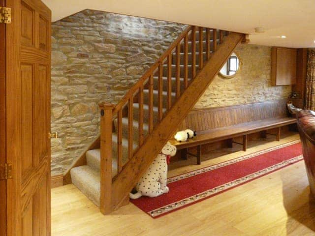 open plan stairs lead out of the spacious lounge | Hollin Bank Cottage, Salterforth, near Barnoldswick