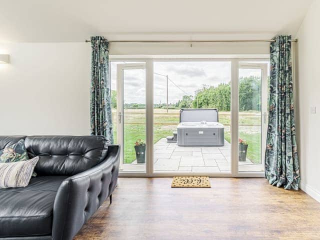 Living room | Kings Lodge - Beech Farm Barns, Neatishead