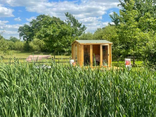 Shared summerhouse and lounger | Lottie&rsquo;s Luxurious Lodge, Star&rsquo;s Special Sanctuary - Lower Farm Lodges, Chart Sutton, near Maidstone