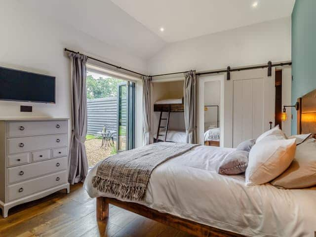 Family bedroom | Walnut Tree Barn, Barnham