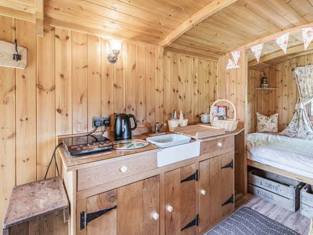 Kitchen/diner | The Kingfisher - Longwool Shepherds Huts, Old Woodhall