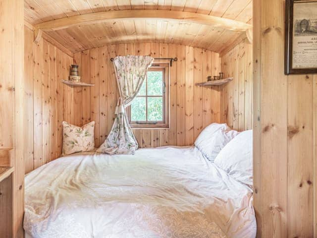 Bedroom | The Kingfisher - Longwool Shepherds Huts, Old Woodhall