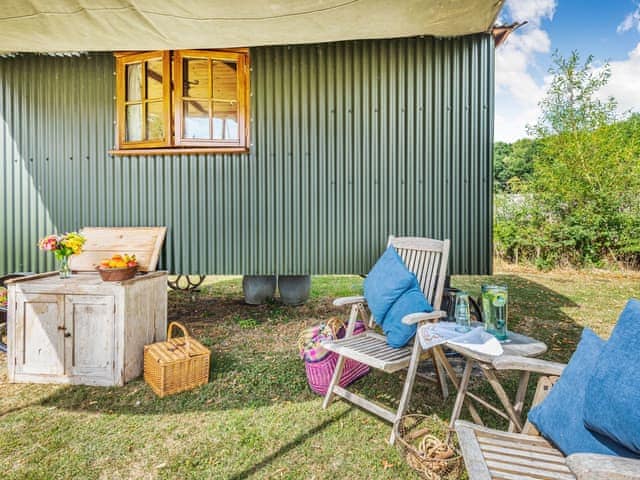 Sitting-out-area | The Kingfisher - Longwool Shepherds Huts, Old Woodhall