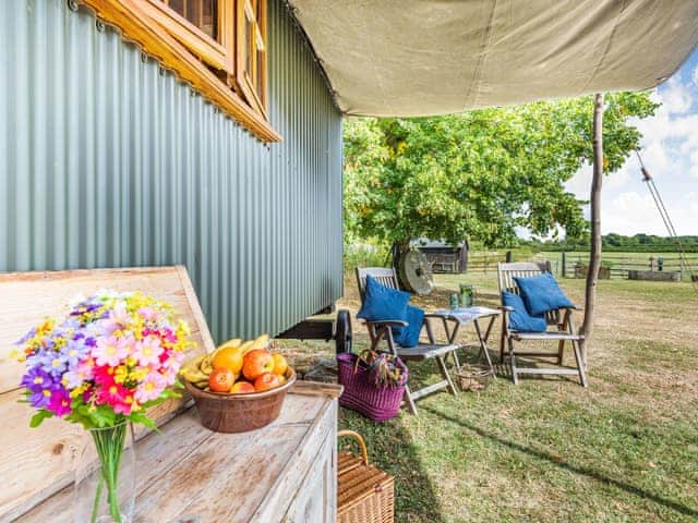 Sitting-out-area | The Kingfisher - Longwool Shepherds Huts, Old Woodhall