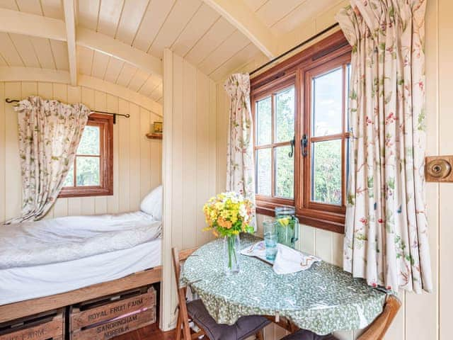 Bedroom | The Nuthatch - Longwool Shepherds Huts, Old Woodhall