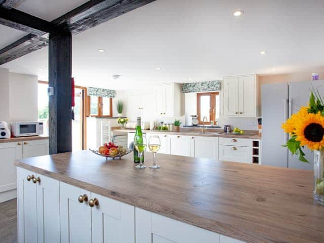 Kitchen area | Four Seasons Cottage, Torrington