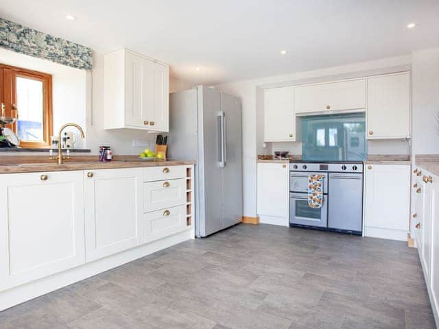 Kitchen area | Four Seasons Cottage, Torrington