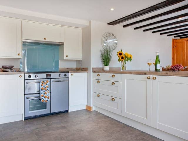 Kitchen area | Four Seasons Cottage, Torrington