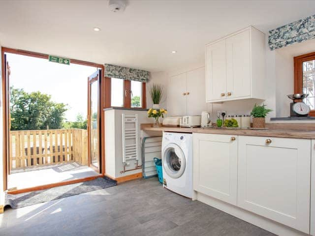 Kitchen area | Four Seasons Cottage, Torrington