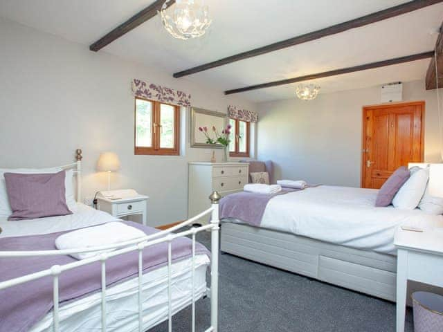 Ground floor family bedroom | Four Seasons Cottage, Torrington