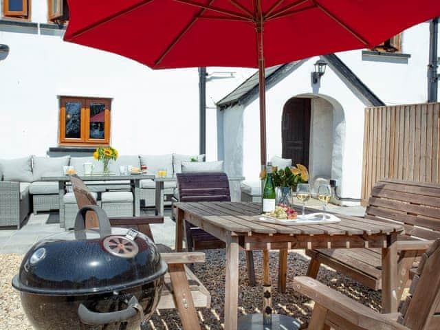 Outdoor area | Four Seasons Cottage, Torrington