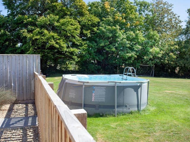 Swimming pool | Four Seasons Cottage, Torrington