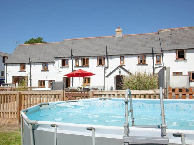 Swimming pool | Four Seasons Cottage, Torrington