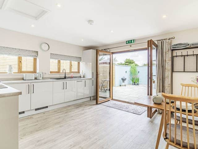 Kitchen/diner | Wisteria Lodge - Roydon Retreats, Roydon, near Diss