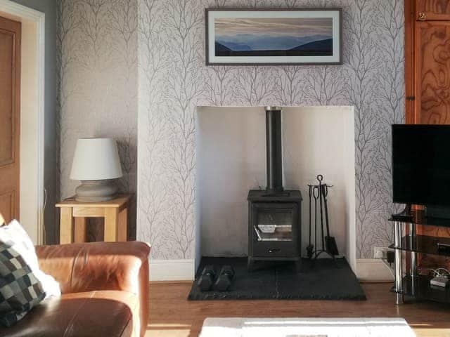 Attractive living room with wood burner | Glaramara, Kendal