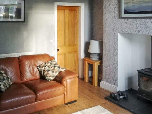 Attractive living room with wood burner | Glaramara, Kendal