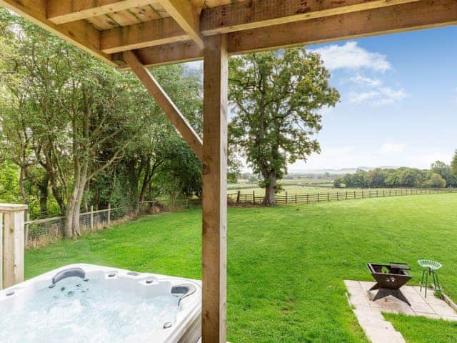 Hot tub | Breidden Lodge - Sweeney Farm Glamping, Sweeney, near Oswestry