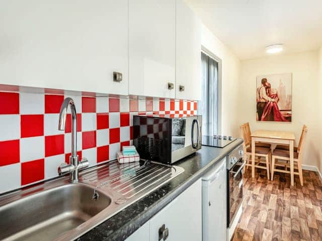 Kitchen/diner | Rainbow Bungalow 2 - Kings Caravan Park, Chapel St Leonards